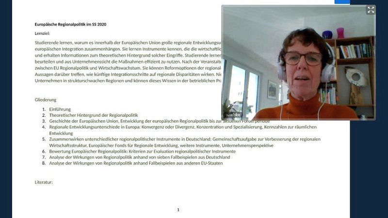 Videokonferenz BigBlueButton: Frau Prof. Dr. Störmann mit Headset sowie erste Folie der Vorlesung Europäische Regionalökonomik