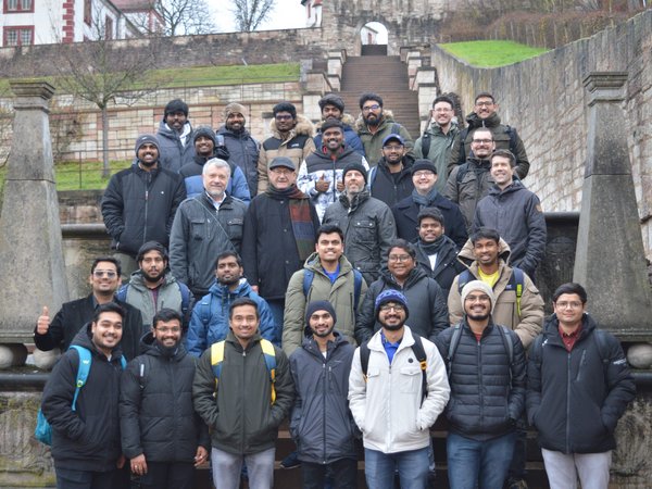 IEW participants on stairs