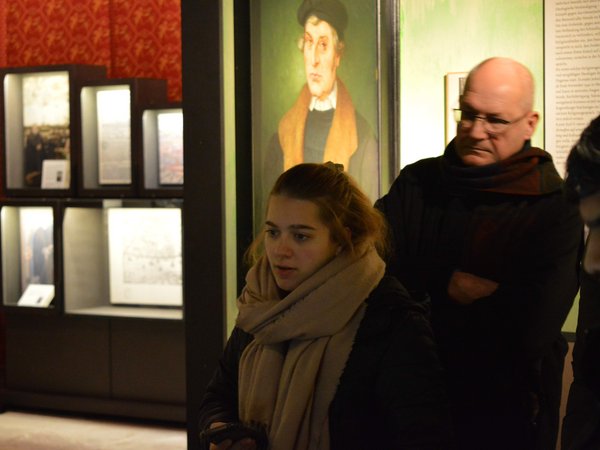 Participants listen to a guided tour 