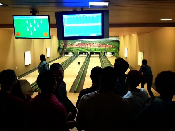 Participants play bowling