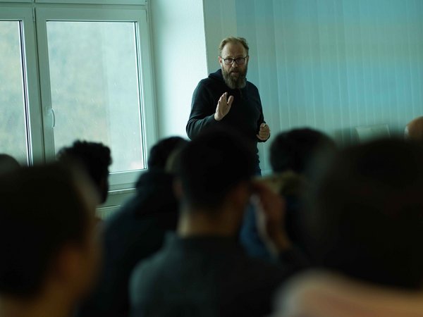 IEW participants listen to presentation 