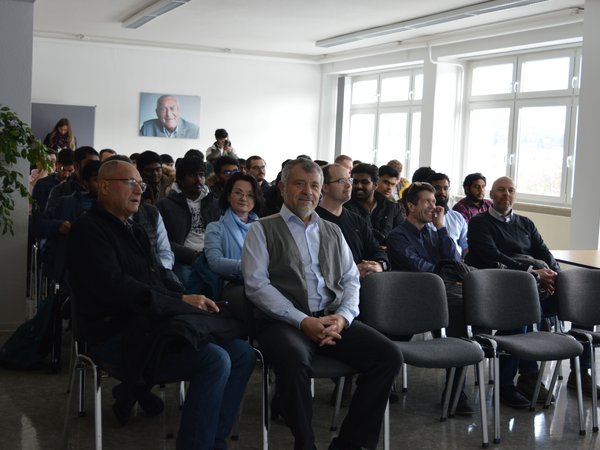 Participants listen to lecture 