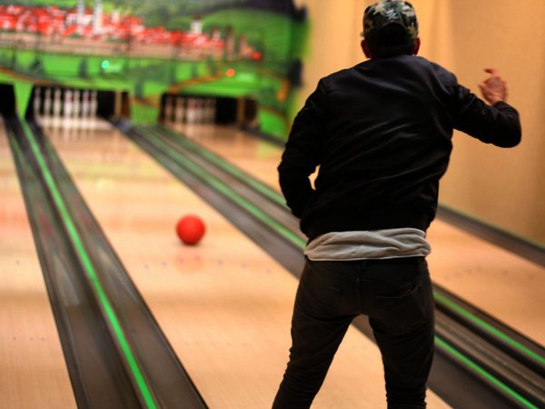 Participant plays bowling 