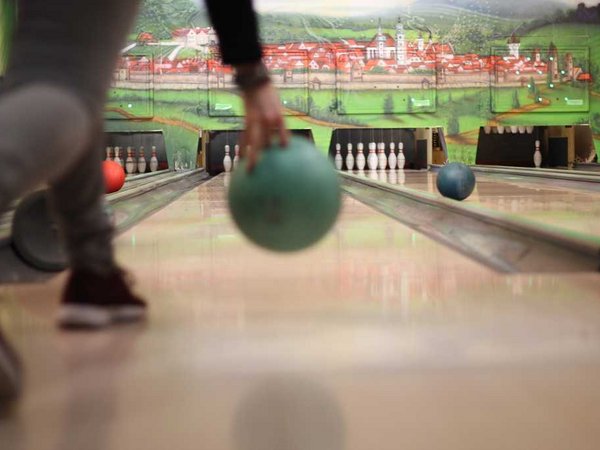 Participants play bowling