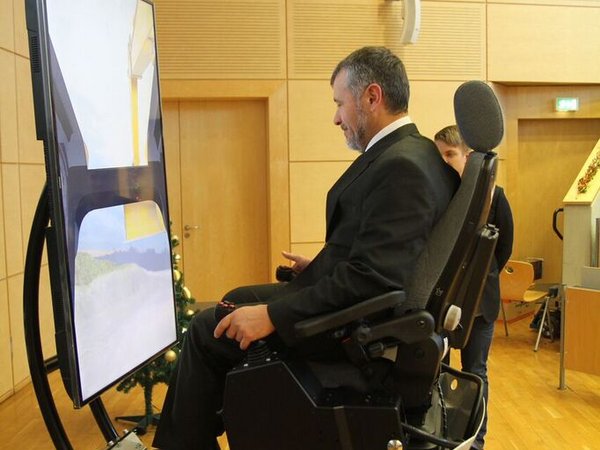 Professor Kolev in the excavator simulator