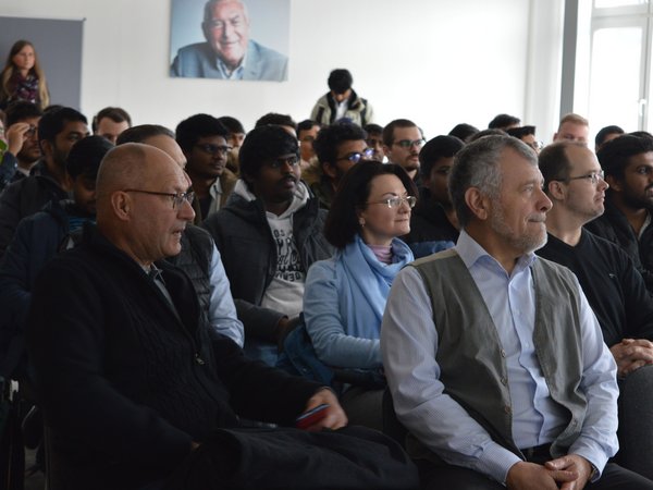 Participants listen to lecture 