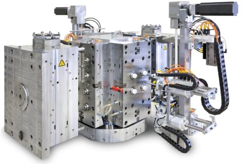 Total Integrated Manufacturing - multi-component cube mould with assembly station Photo: ZAHORANSKY AG, Todtnau-Geschwend Total Integrated Manufacturing - multi-component cube mould with assembly station Photo: ZAHORANSKY AG, Todtnau-Geschwend