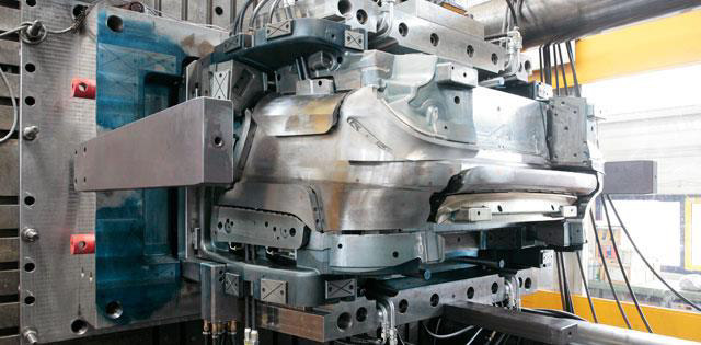 Half of an injection mould for a front bumper Source: Schneider Form GmbH Half of an injection mould for a front bumper Source: Schneider Form GmbH